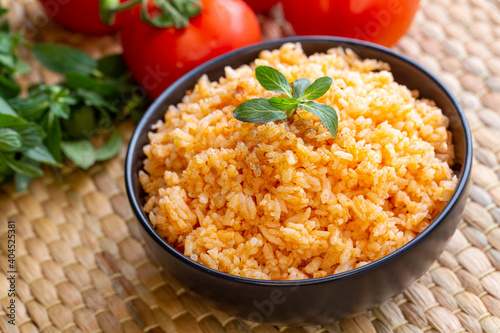 Traditional delicious Turkish food; rice pilaf with tomatoes (Turkish name; Domatesli pirinc pilavi)