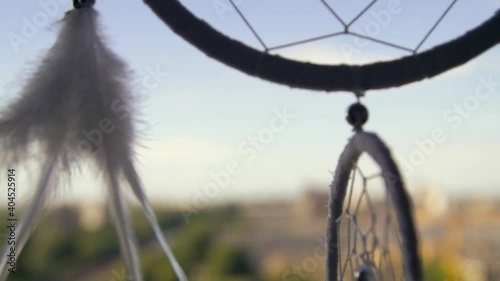 Extreme Close Up Shot of Dreamcatcher Rotating In the Wind photo