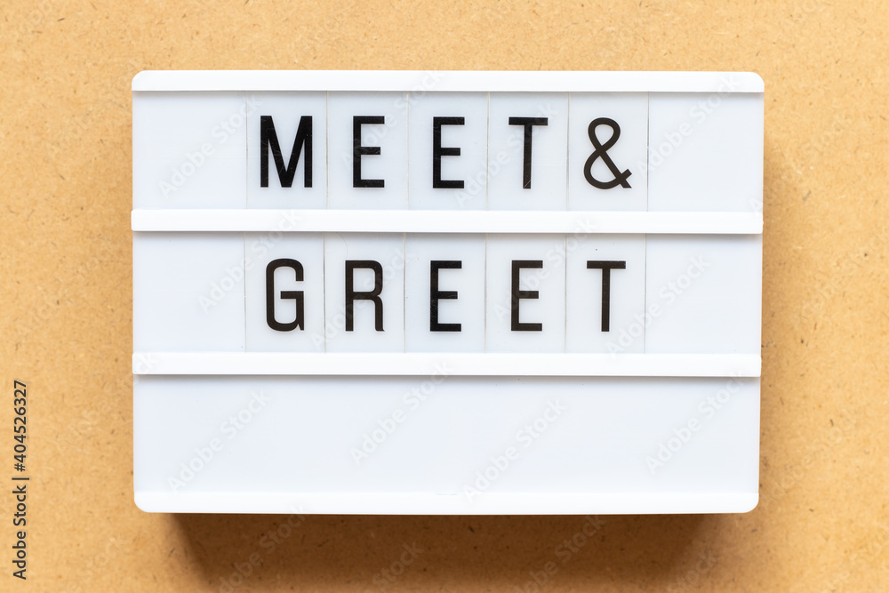 Ταπετσαρία Lightbox with word meet and greet on wood background