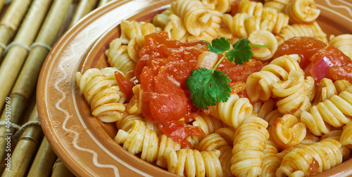 Fusilli alle erbe e pomodorini photo