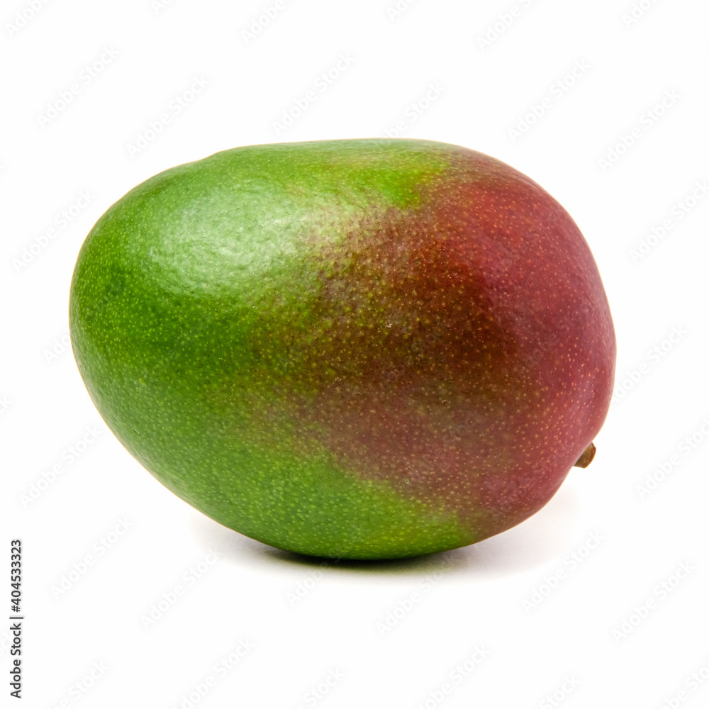 Green red ripe mango tropical fruit isolated on a white background closeup shot Green red ripe mango tropical fruit isolated on a white background closeup shot