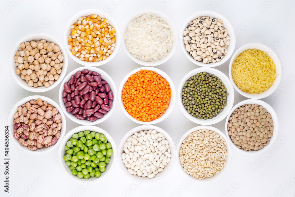 Mixed dried legumes and cereals isolated on white background, top view Mixed dried legumes and cereals isolated on white background, top view