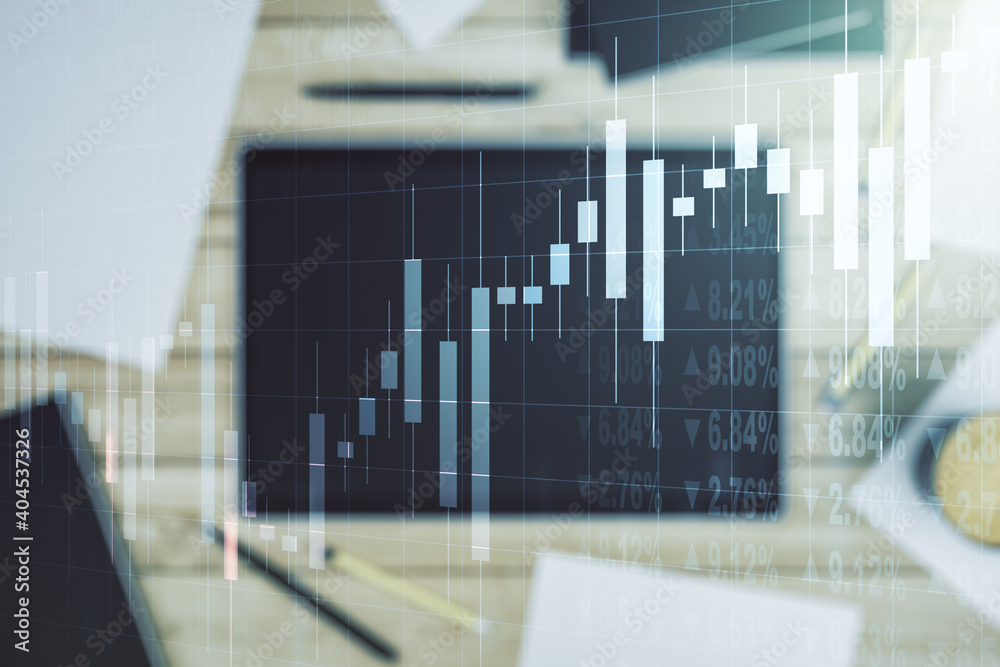 Double exposure of abstract creative financial diagram and modern digital tablet on background, banking and accounting concept