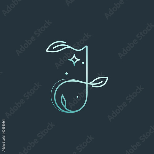 J letter logo with graceful with moon, stars and leaves decoration.