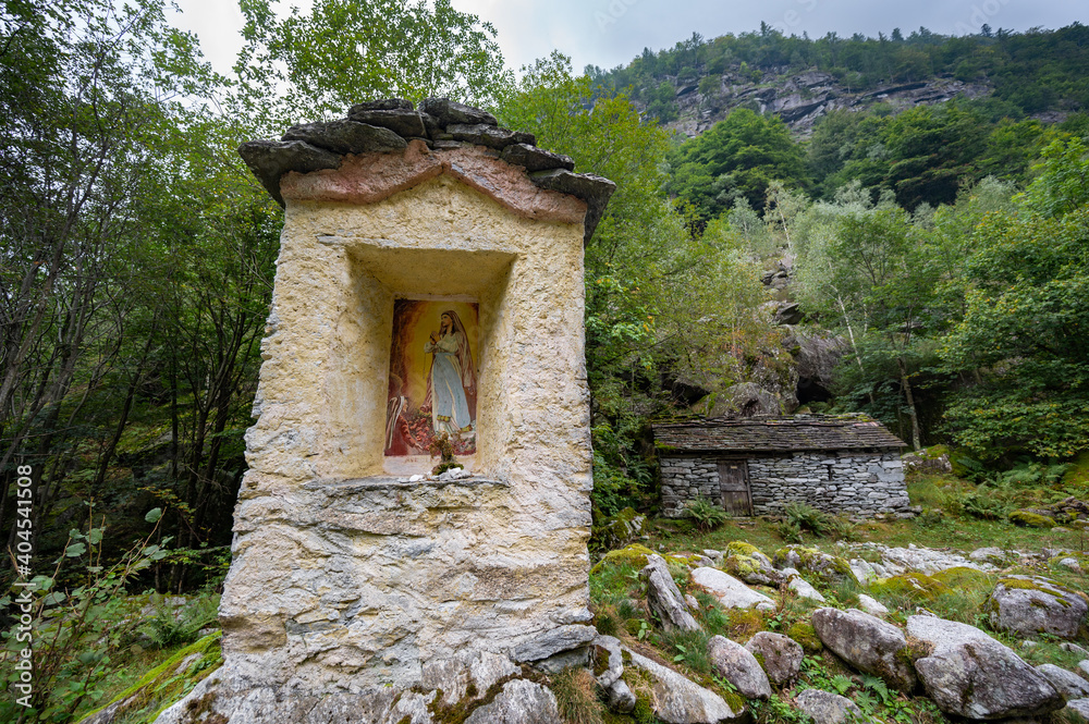 Shrine along hiking trail on Calnegia River near hamlet of Foroglio, Ticino, Switzerland