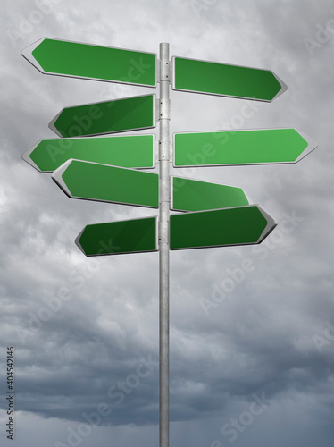 green directionl signs on a cloudy sky background