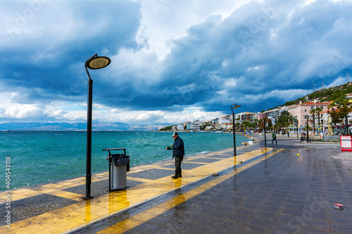 Fototapeta Naklejka Na Ścianę i Meble -  Cesme coastal view at windy day in Cesme Town of Izmir Province. Cesme is populer tourist destination in Turkey.