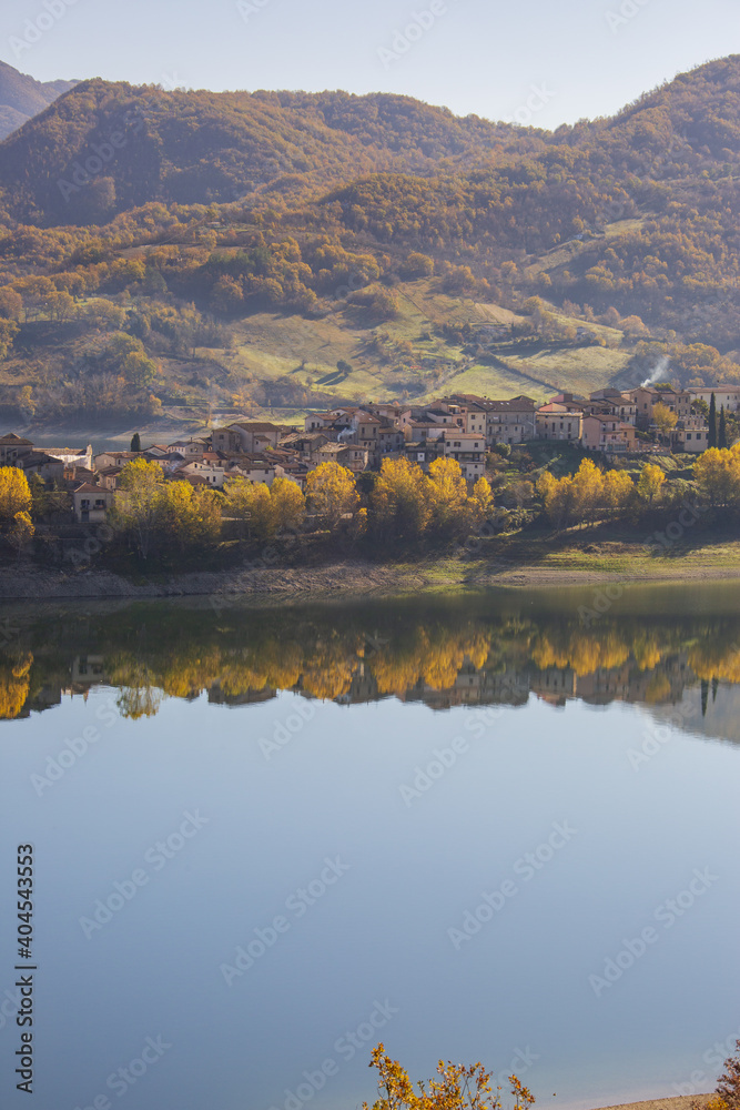 Lake Turano in Rieti.The colors of autumn. Reflections in water