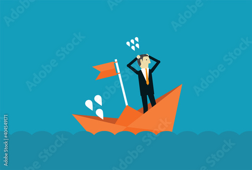 Businessman and sinking boat