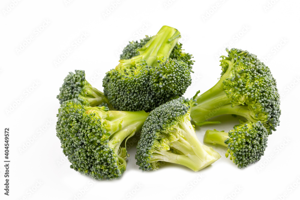 Green fresh broccoli on the white background Green fresh broccoli on the white background