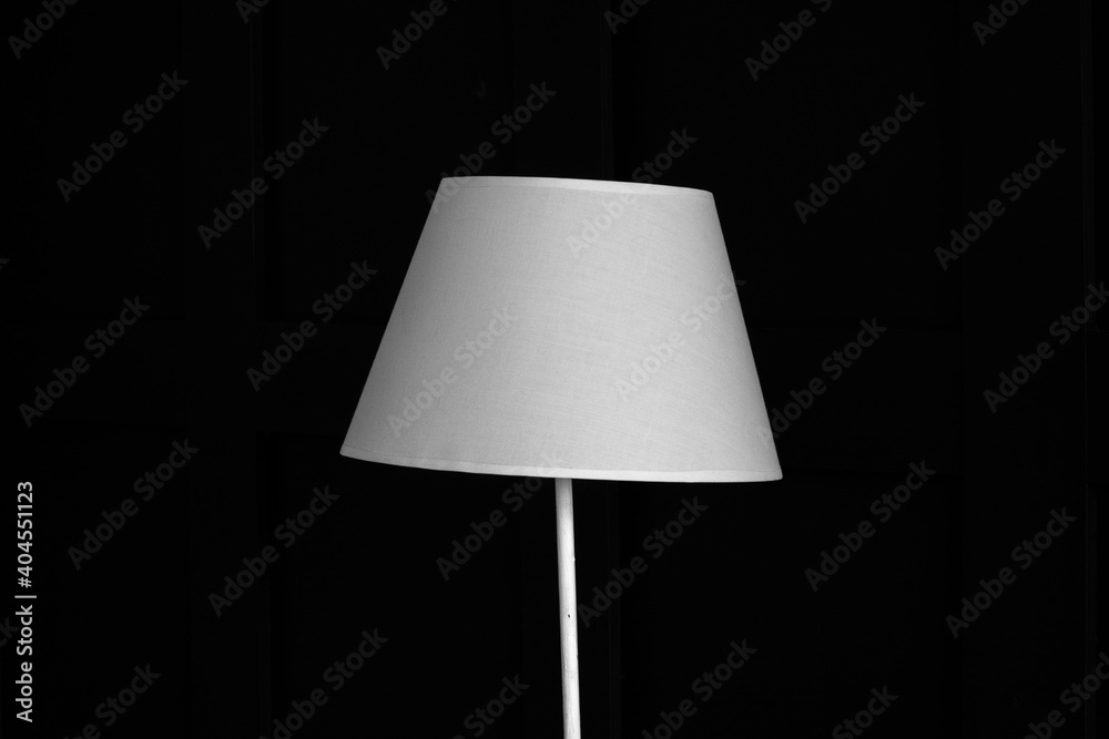 white lampshade on a black background