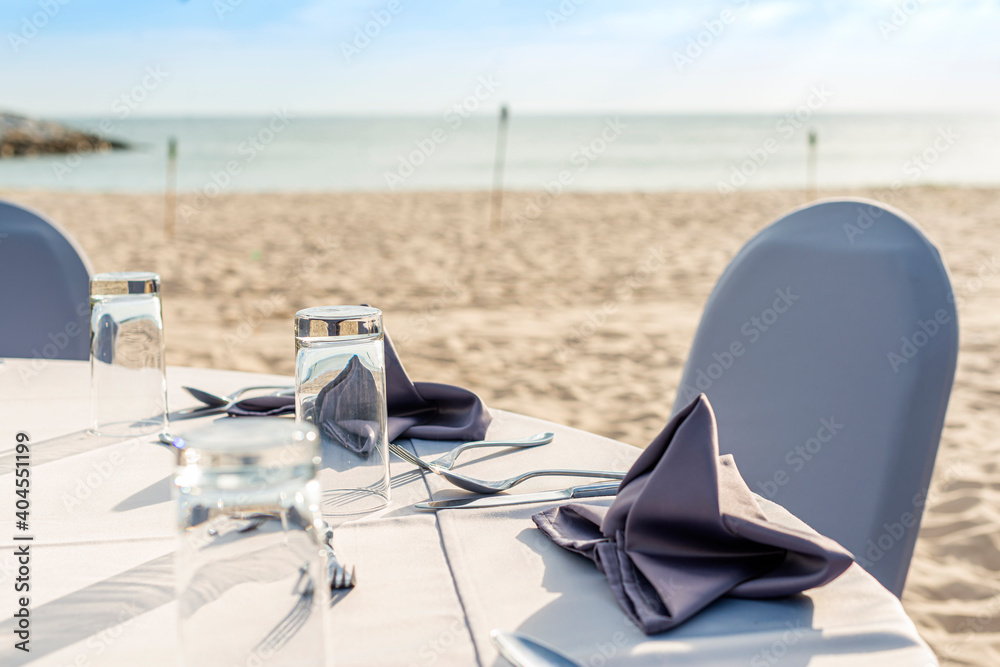 Modern restaurant design table for dinner party on the beach. Modern restaurant design table for dinner party on the beach.