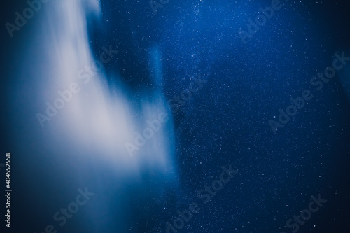 Wallpaper Mural View of a night blue sky with a stars in the countryside. Milky way under the clouds. Torontodigital.ca