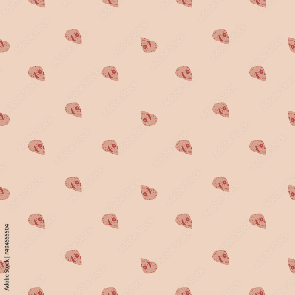 Abstract little skull shapes seamless pattern. Pink pastel background. Horror print.