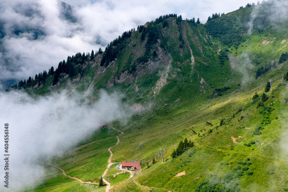 Obraz premium view with the top of mount Muttelbergkopf in Austria among heavy clouds