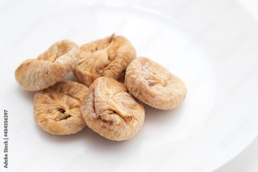 Dried figs fruit on white plate