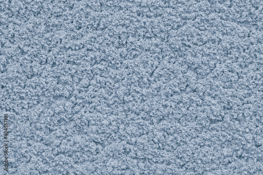 Solid background of soft pastel color with rough plaster texture. Abstract blank for design