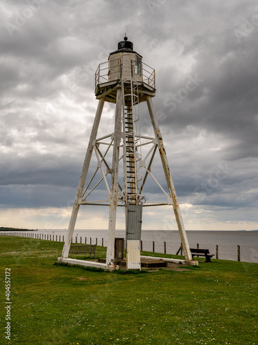 Clouds over the East Cotes Lighthouse in Silloth, Cumbria, England, UK photo