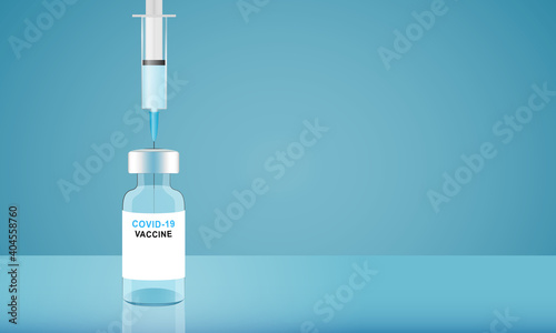 Covid-19 vaccine background. Glass bottle with injection syringe.