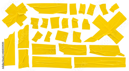 Yellow scotch tape, set of crumpled stripes, colored bright adhesive tape stickers on white background