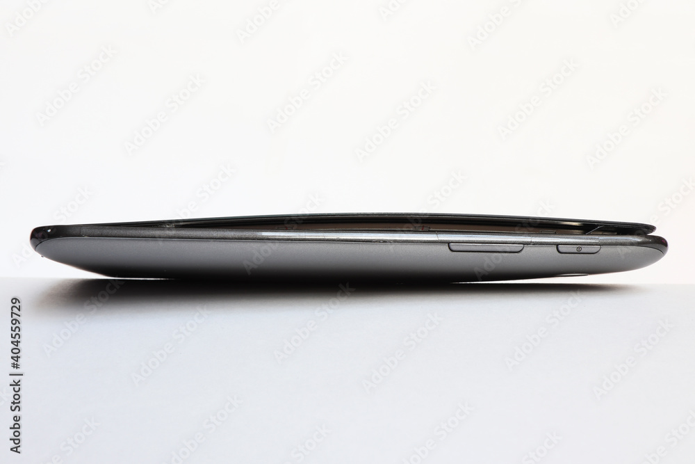 The swollen battery in the tablet tore the screen away from the base of the mount. The swollen battery in the tablet tore the screen away from the base of the mount.