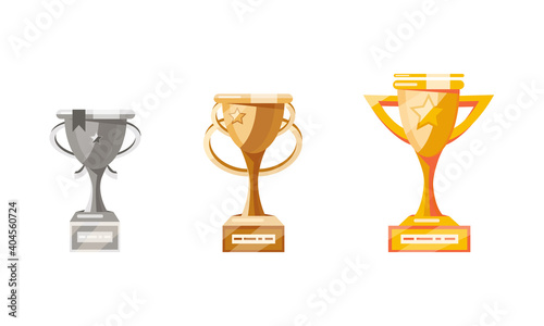 Trophy cups set. Winners cups in flat design style. Silver, Bronze, Gold cups isolated on white background. Vector illustration
