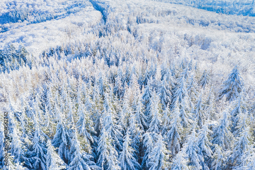 Bird's eye view of the snowy winter landscape in the Untertaunus near Bad Schwalbach / Germany photo