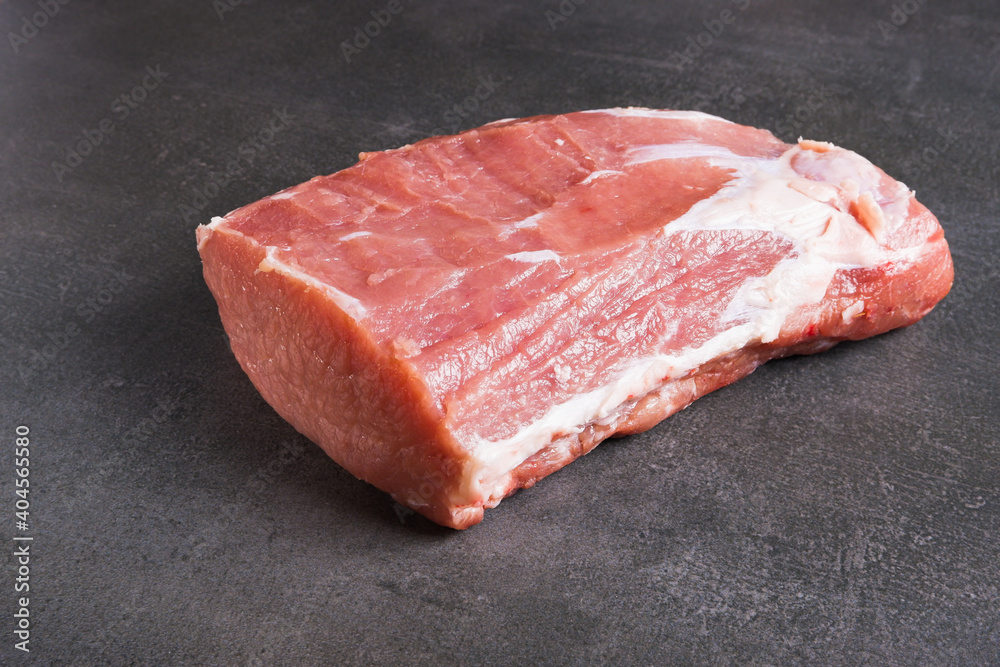 Raw meat. Juicy, appetizing cue ball on a gray background. Raw meat. Juicy, appetizing cue ball on a gray background.