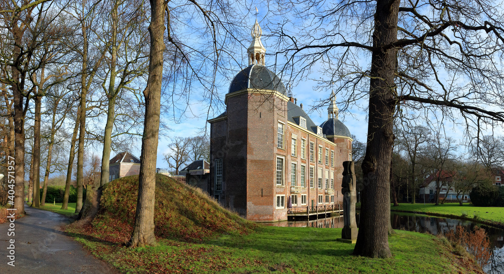 Endegeest  castle near Leiden, Netherlands, in winter; the hillock in front is an ice cellar to store ice from the moat for summer cooling of  food.