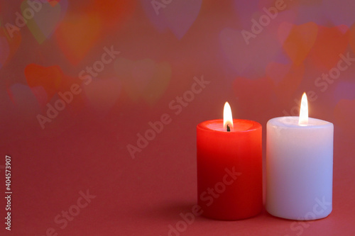 Valentines day banner. Two candel on the red background. Romantic background