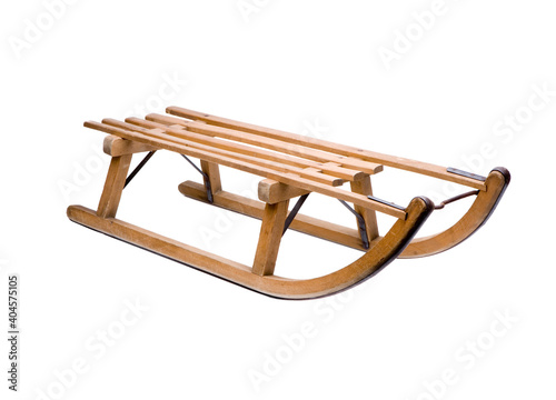 alter holzschlitten auf weissem Hintergrund