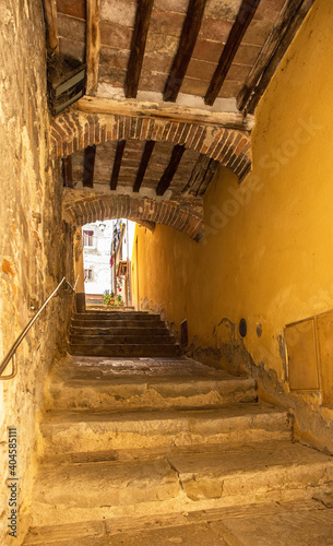 An alley in the historic medieval town of Montepulciano in Siena Province  Tuscany  Italy 