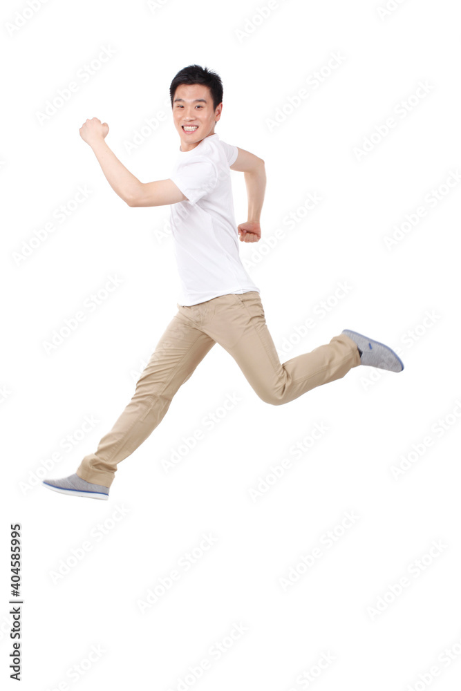 A happy young Business man Jumping up A happy young Business man Jumping up