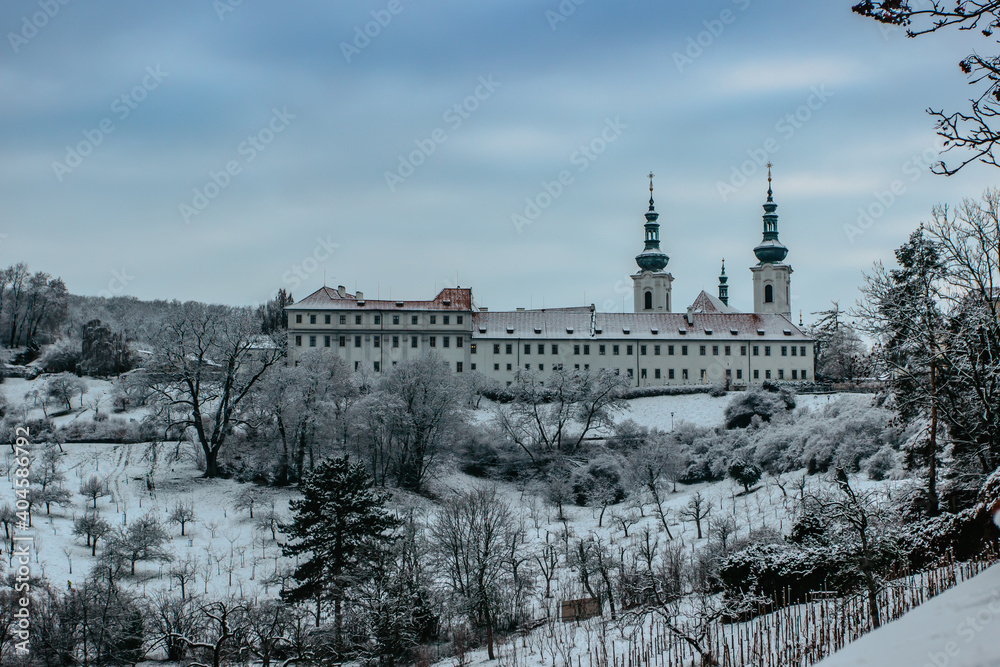 Winter view of Strahov Monastery with church of the Assumption of the Blessed Virgin Mary, Prague, Czech Republic.The oldest Premonstratensian monastery in Bohemia. European tourist attraction.