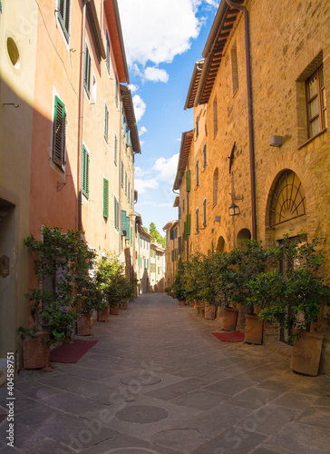 A residential road in the historic medieval village of San Quirico D Orcia  Siena Province  Tuscany  Italy 