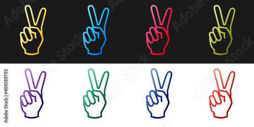 Set Hand showing two finger icon isolated on black and white background. Victory hand sign. Vector.