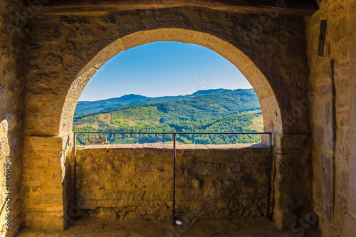 A partially blocked arch overlooking the nearby landscape in the historic medieval village of Santa Fiora in Grosseto Province, Tuscany, Italy
 photo