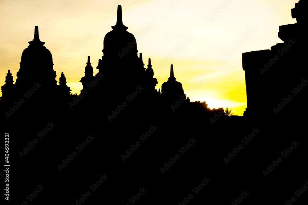Silhouettes of Prambanan temple at sunset