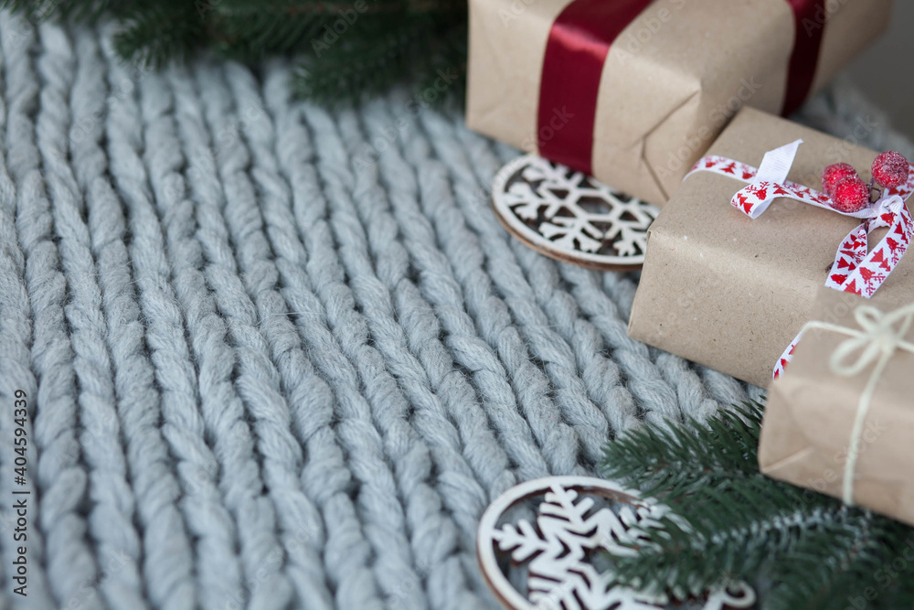 Gift boxes with ribbons on a knitted background. Congratulations on the holidays. Love concept.