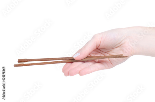 Sushi sticks in hand on white background isolation