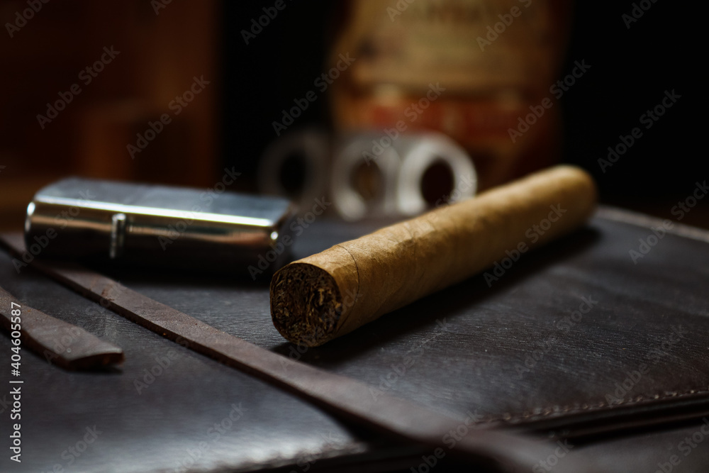 Fototapeta premium Cigar on a notebook case