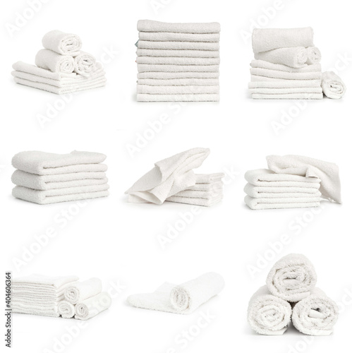 set of white beach towels isolated on white background photo
