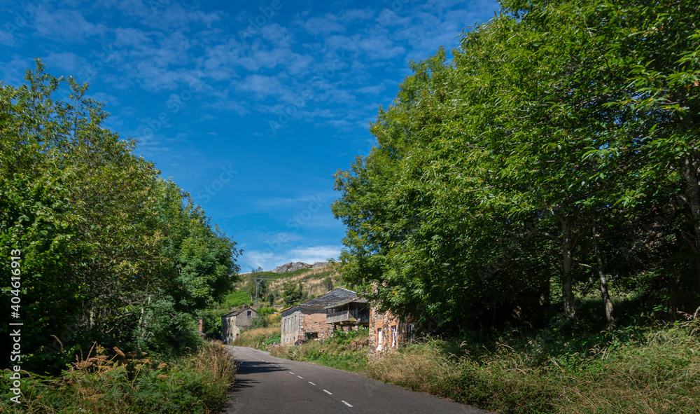 View of a farm building on the side of a road in Asturias, Spain View of a farm building on the side of a road in Asturias, Spain