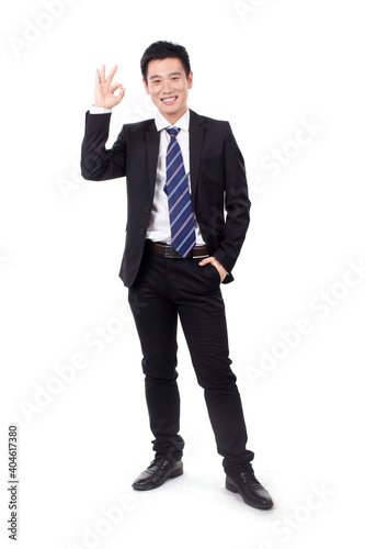 A Business man laughing with fists up