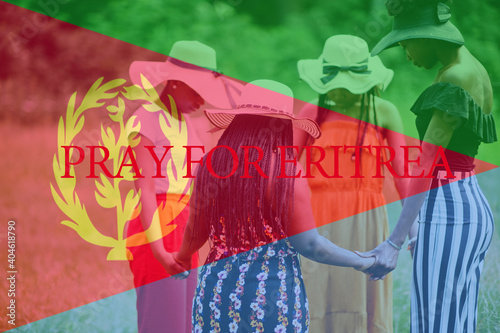 Pray for Eritrea. Group of four african women holding hands and praying. Concept of crisis in Africa country.