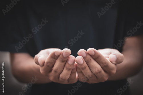 Human open hands. Holding, giving, showing concept. Male hands as if holding something.