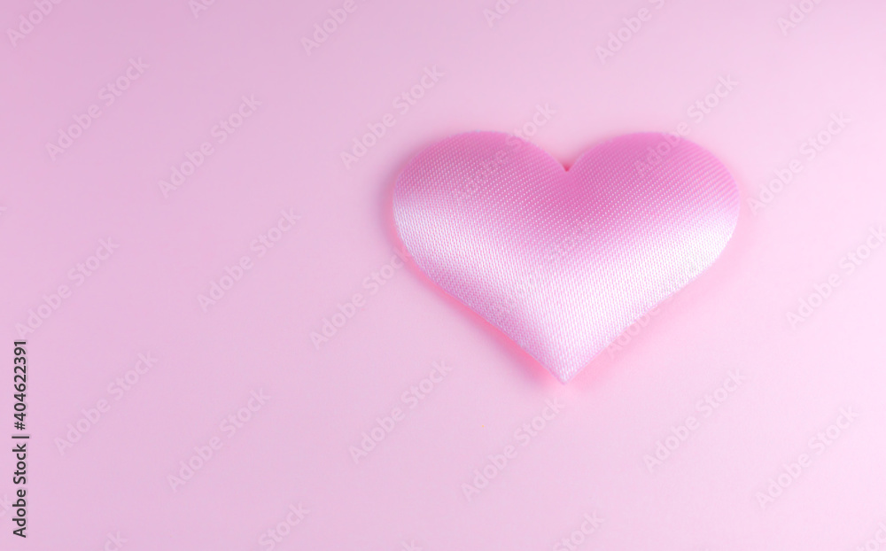 Pink heart on pink background. Saint Valentine's day concept. Love and romantic photo. Postcard for holiday. Beautiful warm wallpaper with love. Soft focus. Copy space. Pink heart on pink background. Saint Valentine's day concept. Love and romantic photo. Postcard for holiday. Beautiful warm wallpaper with love. Soft focus. Copy space.