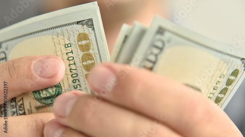 Close up of businessman with dollars money
