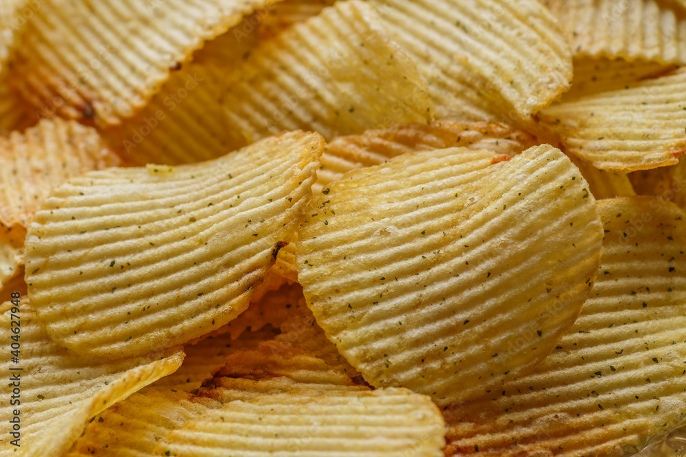 Potato chips or crisps .Potato chips texture background flat overhead view.concept of fast food and snacks. Food background. Potato chips or crisps .Potato chips texture background flat overhead view.concept of fast food and snacks. Food background.