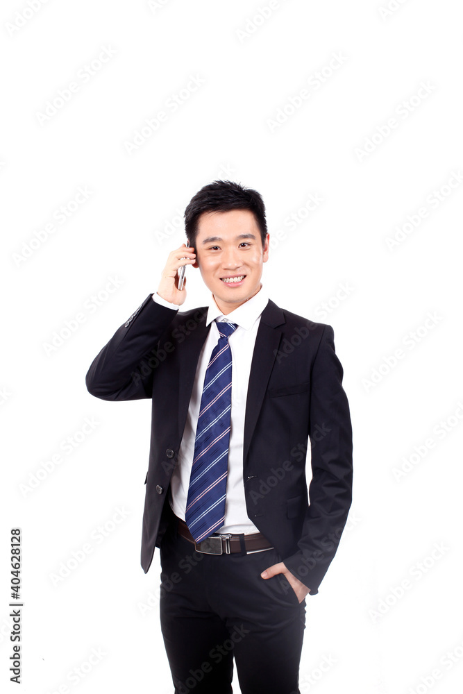 Portrait of a businessman standing with cellular phono Portrait of a businessman standing with cellular phono